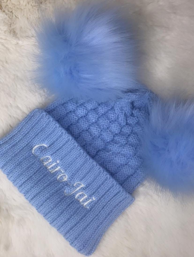 Blue pom pom hat