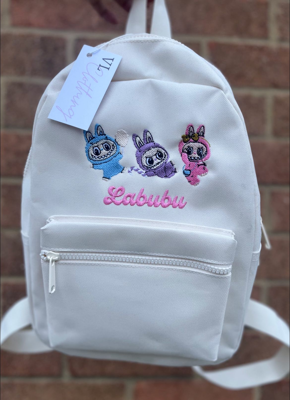 Doll embroidered backpack