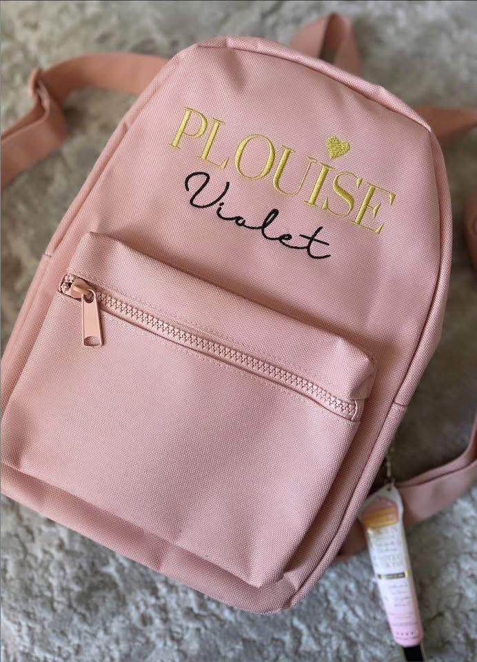 Gold embroidered backpack